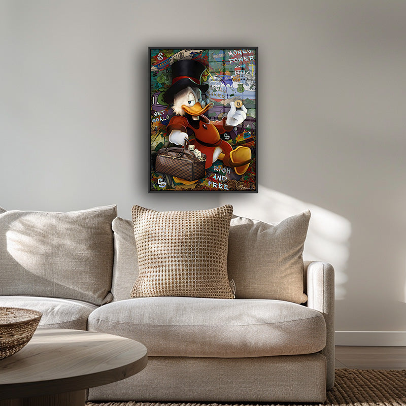 The Rich Duck painting in a black frame inside