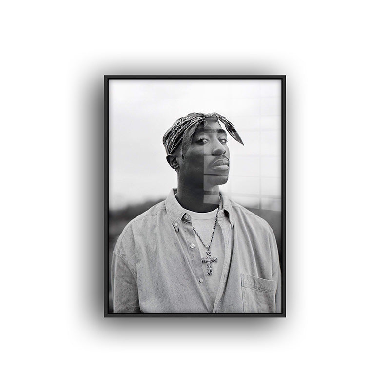 Painting of tupac in a black frame front view