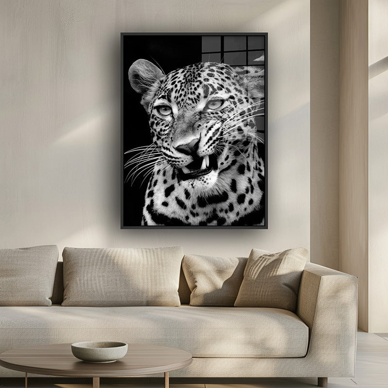 Painting of baby panther in a black frame inside