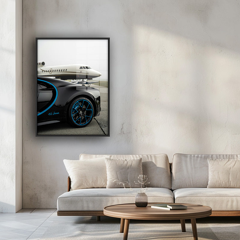 Painting of Bugatti plane in a black frame inside