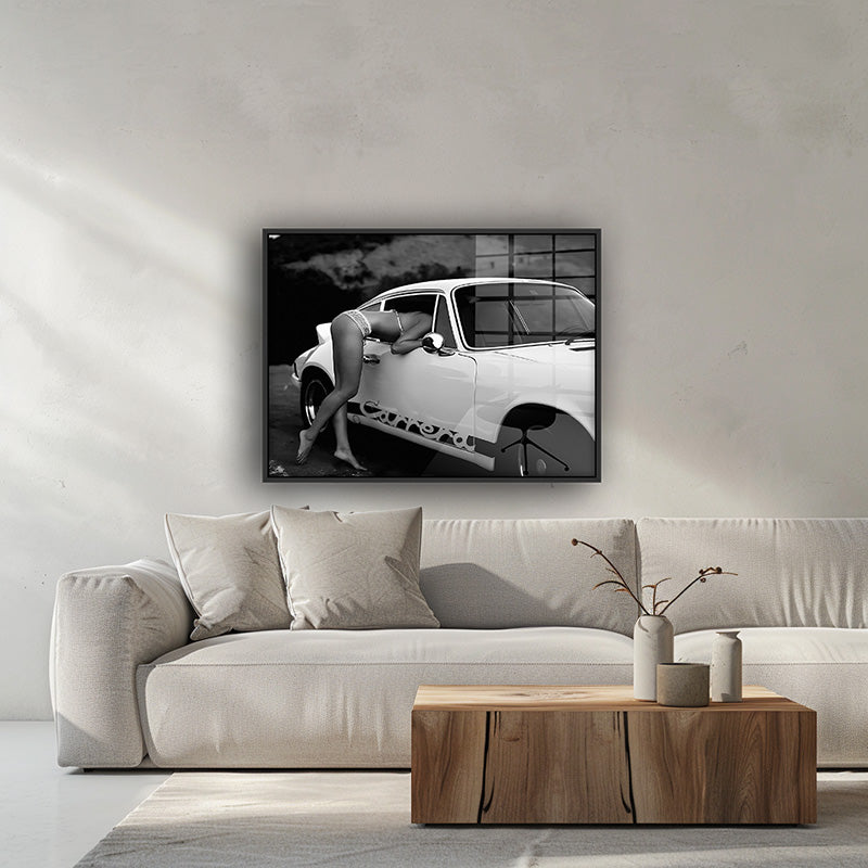 Carrera painting in a black frame inside