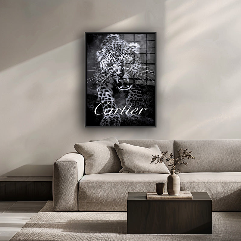 Painting of Cartier cheetah in a black frame inside