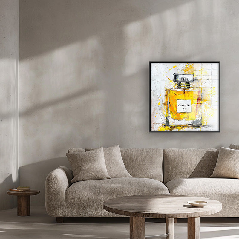 Painting of Chanel parfum in a black frame inside