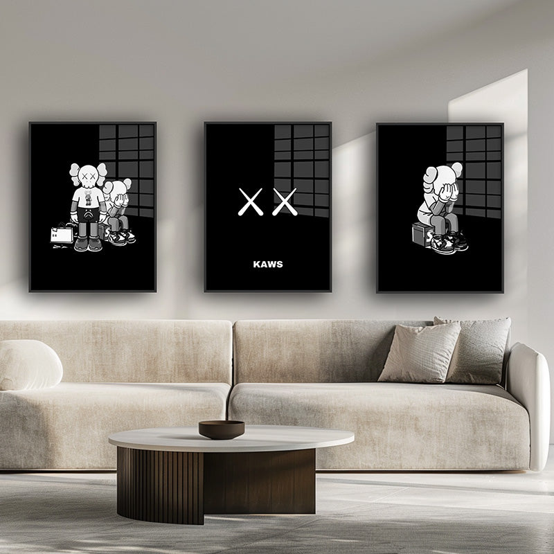 Painting of friends of Kaws in a black frame inside