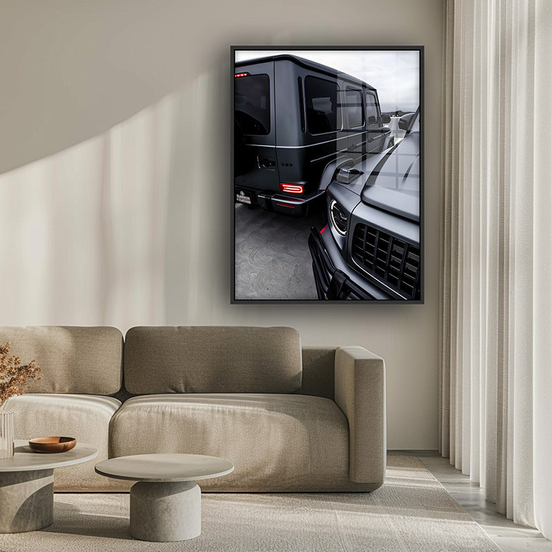 Painting of G Wagons in a black frame inside