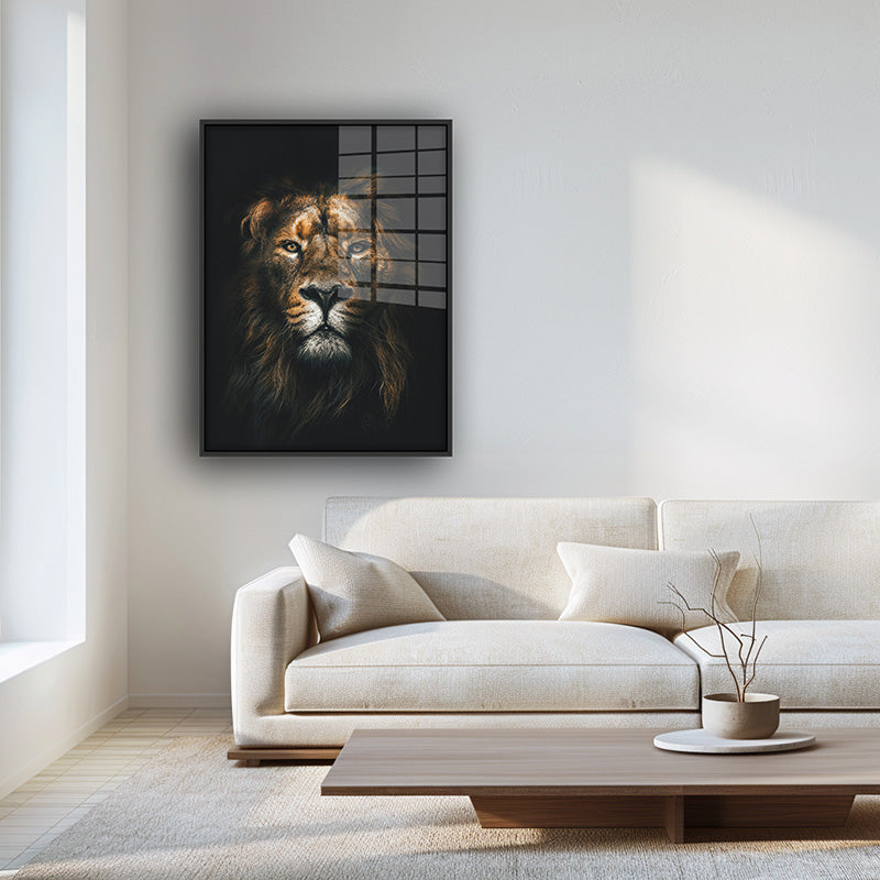 Painting of lion face in a black frame inside