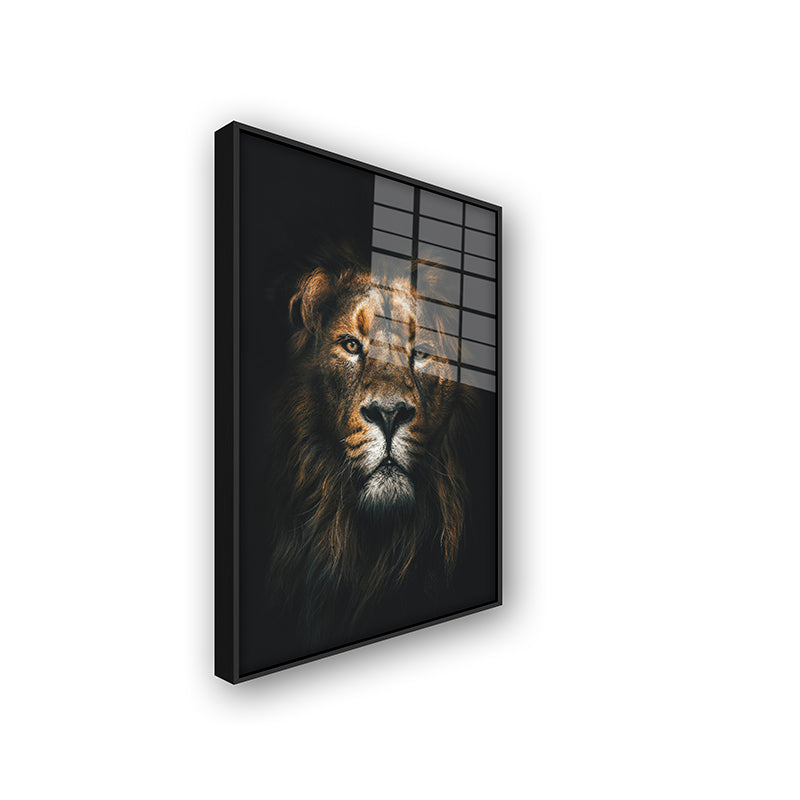 Painting of lion face in a black frame side view