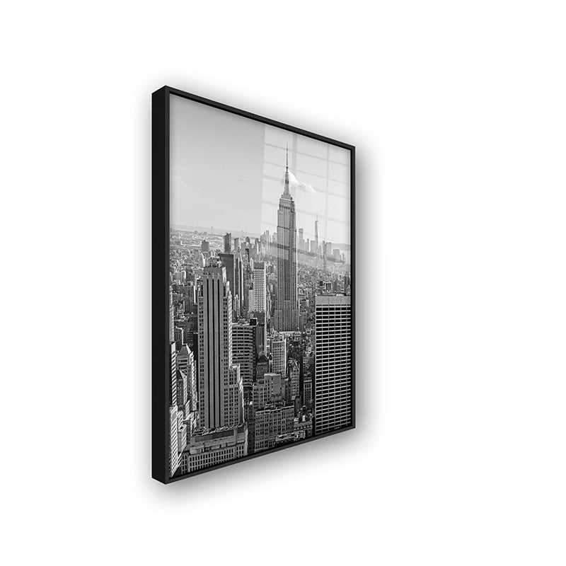 Painting of Manhattan in a black frame side view