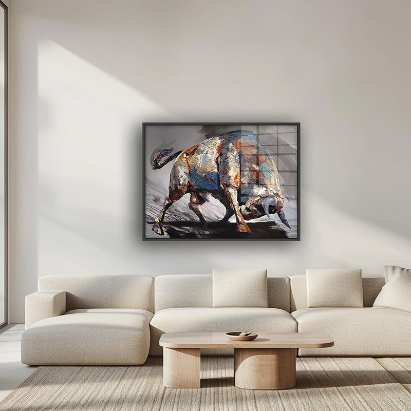 The Bull painting in a black frame inside