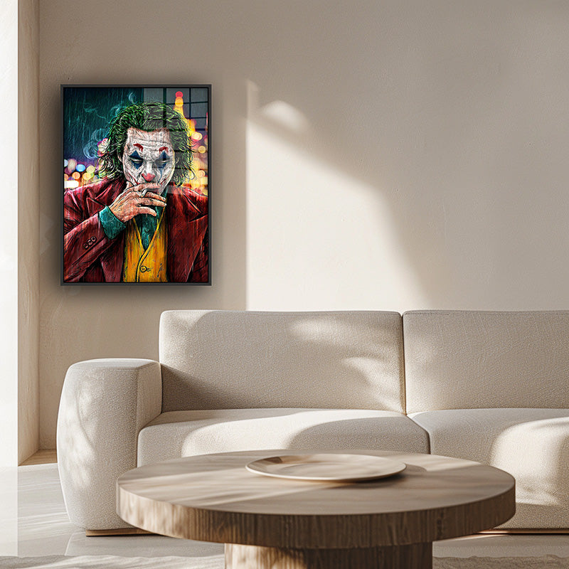 Painting of the Joker in a black frame inside