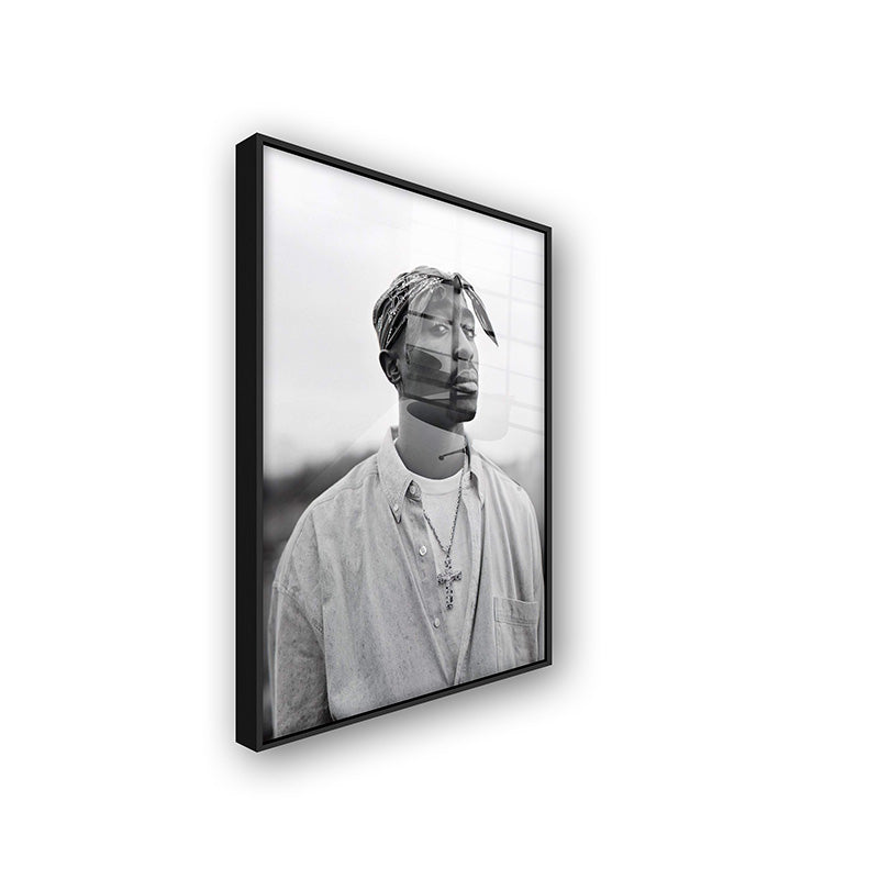 Painting of tupac in a black frame side view