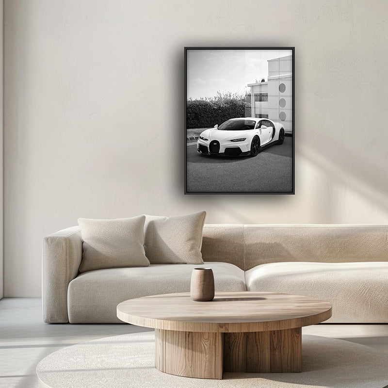 Painting of white Bugatti in a black frame inside