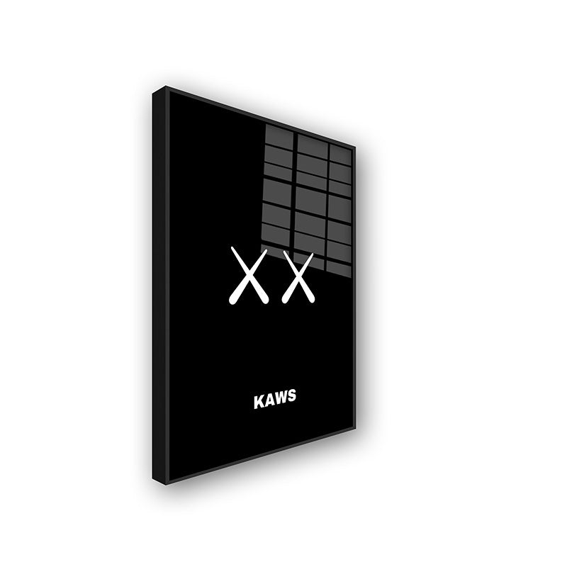 Painting of XX by Kaws in a black frame side view